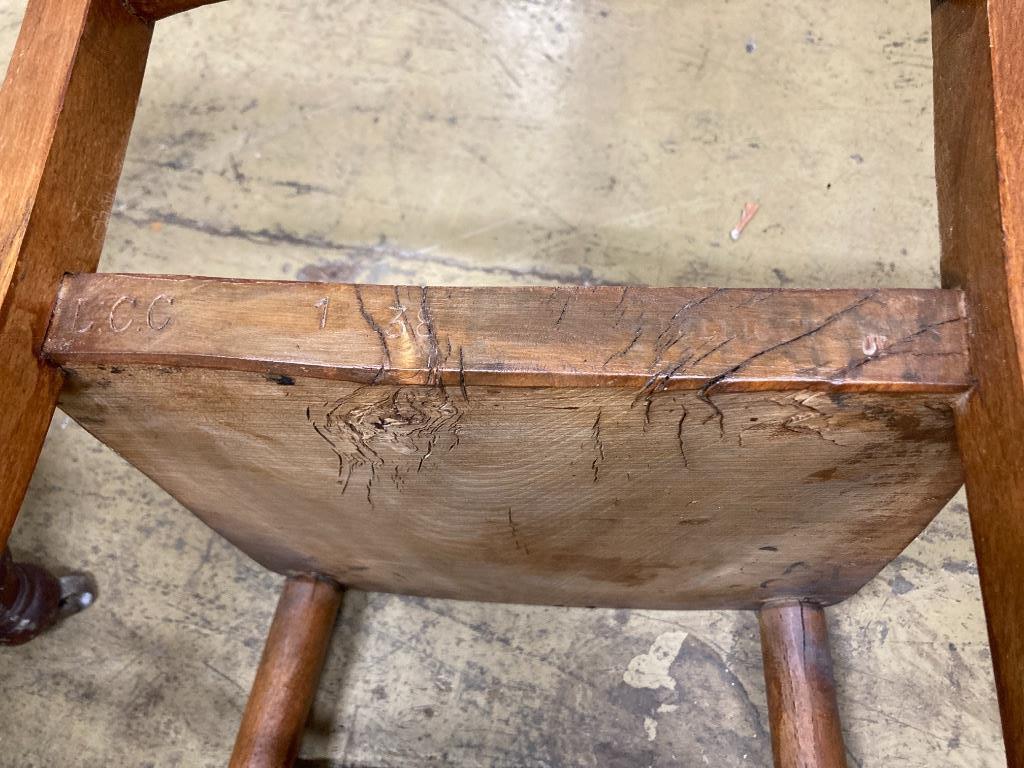 A set of six early 20th century beech chairs stamped 'Elliott & Son'